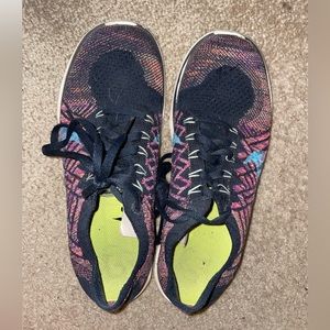 Multi colored Nike Women’s fly knit running shoes